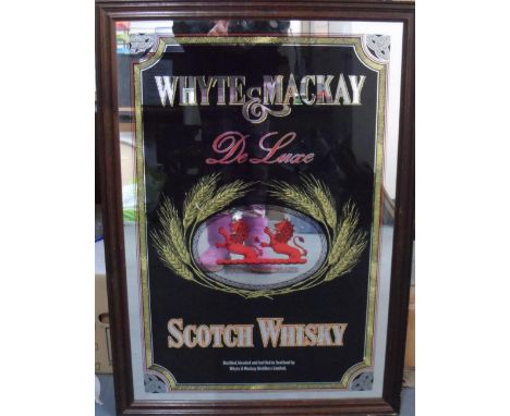 Whyte & MacKay, Scotch whiskey advertising mirror in oak frame,The mirror measures 80 x 52 cm 