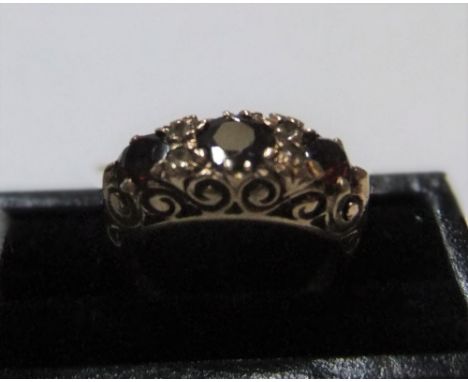 9ct yellow gold 3 stone garnet ringApprox 3.9 grams gross,            size K/L 