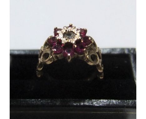 Modernist 9ct yellow gold ruby cluster ring with unusual circular shouldersApprox 3.2 grams gross,           size J 