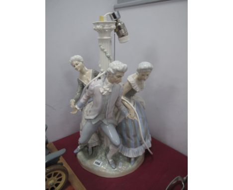 A Lladro Tarantela Pottery Table Lamp, featuring three Regency figures holding hands numbered N-12A 54cm high, excluding fitt