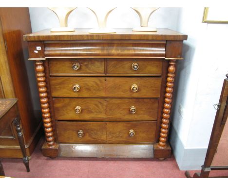 A XIX Century Mahogany Straight Fronted Chest, with upper cushion drawer and two short and three long drawers, having tortois