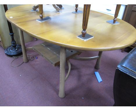 An Ercol Golden Dawn Extending Dining Table, with a 'X' strecher.