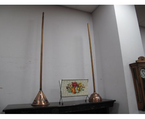 Two Vintage Copper Dolly's, together with a 1960's magazine rack. (3)