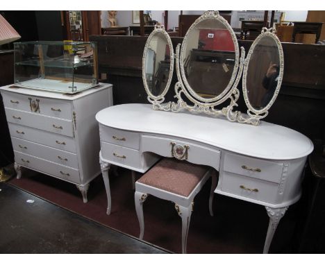 A Vintage White Repainted French Style Three Piece Bedroom Suite, chest of drawers, dressing table and a stool, chest with fo