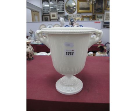 A Royal Worcester Urn, of twin handled campagna form, in plain cream with beaded rim and acanthus leaf moulding, green printe