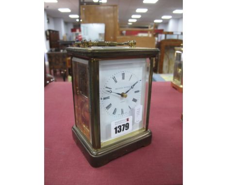 Matthew Norman of London Brass Cased Carriage Clock, 14cm high with handle down.
