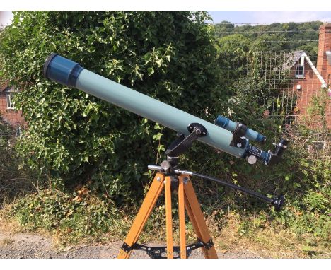 A Prinz Astral 400 Refractor Telescope with tripod, eye piece, barlow lens, right angle prism etc in original box and in good