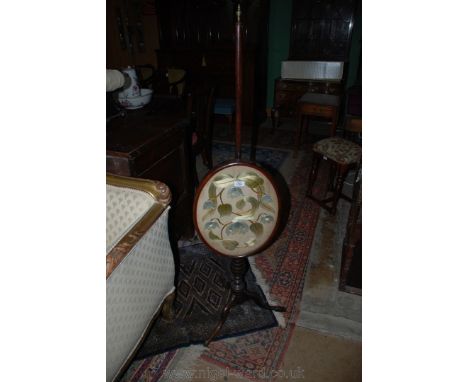 A 19th c. Mahogany Pole Screen, with brass finial top to the turned pole with oval Mahogany framed screen with embroidered st