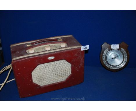 A mounted aneroid Barometer and a Roberts Radio