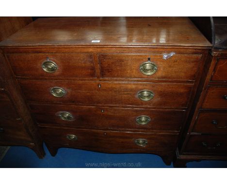 A Georgian Oak Chest of two short over three long graduated Drawers having rectangular top with applied moulded edges, the fi