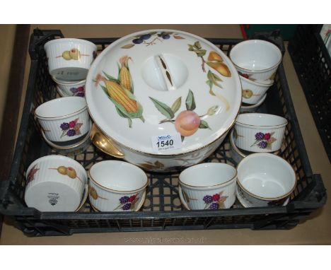 A Royal Worcester 'Evesham' lidded Casserole Dish, 18 small 'Evesham' ramekin dishes and a large matching Souffle Dish.
