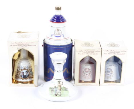 Four commemorative bottles of Bells scotch whisky and a Wade decanter. All boxed, two 50cl, two 75cl, all 40% vol.