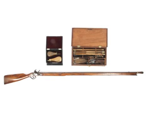 An 18th century flintlock hunting rifle, with two powder flasks and a boxed reloading and cleaning kit