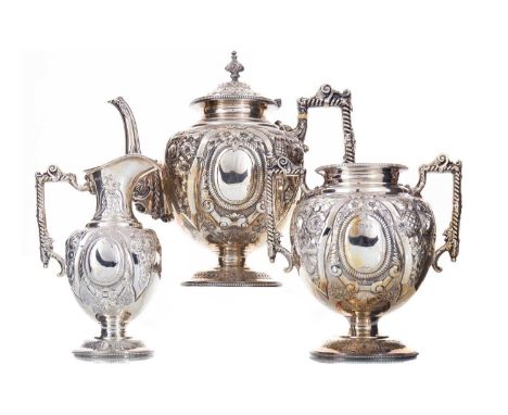 VICTORIAN AND LATER THREE-PIECE SILVER TEA SERVICE WALKER & HALL, SHEFFIELD 1897 AND 1907 the sugar bowl and cream jug 1897, 