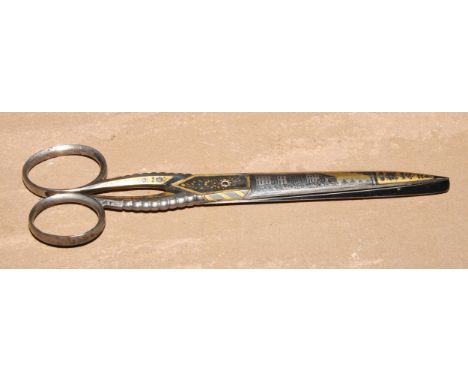 A pair of 19th century Continental gilt damascened steel scissors, decorated with architectural views, 18.5cm long 
