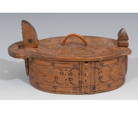 Treen - a Scandinavian Folk Art band box and cover, chip carved decoration throughout, 18.5cm wide, c.1900 