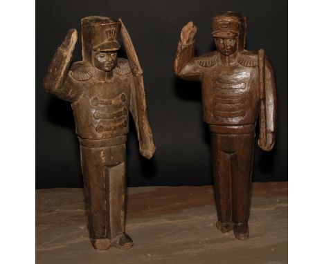 Folk Art - a pair of carved  figures, Napoleonic soldiers, each standing to attention, 41cm high, 19th/early 20th century 