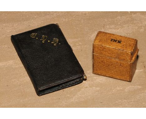 A Victorian leather pocket combination aide memoir, stamp and card case, 9cm long, c.1890; a travelling inkwell, 4.5cm long, 