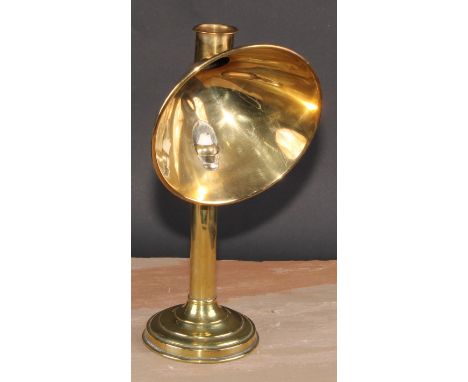 A late 19th century brass table top candle lantern or student's lamp, conical shade, self-adjusting mechanism, stepped circul