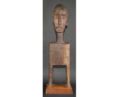 Tribal Art - a large Dogon figural heddle pulley, 68cm high, Mali, West Africa, collector's display plinth, 71cm high overall