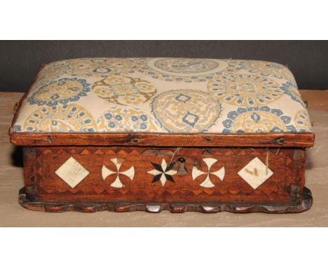 An early 18th century mahogany and marquetry shaped rectangular table box, hinged cover with stuffed-over upholstery, enclosi