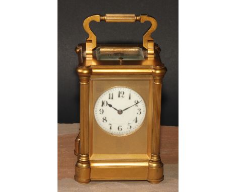 A late 19th century French gilt brass repeater carriage clock, 5.5cm circular enamel inscribed with Arabic numerals, eight-da