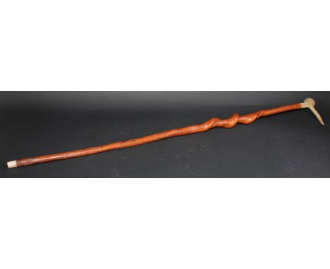 A 19th century twisted hazel walking stick, antler pommel and ferrule, 106cm long 