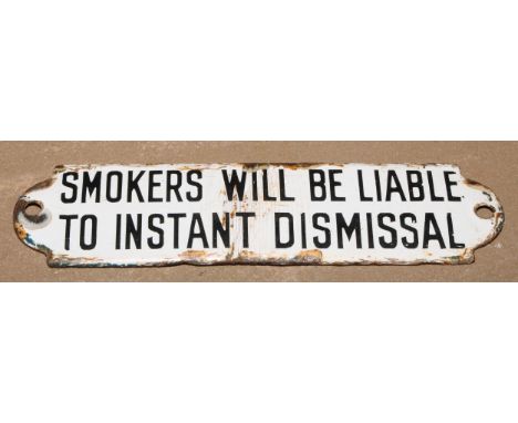 An enamel railway sign or notice, Smokers Will be Liable to Instant Dismissal, 15.5cm wide 