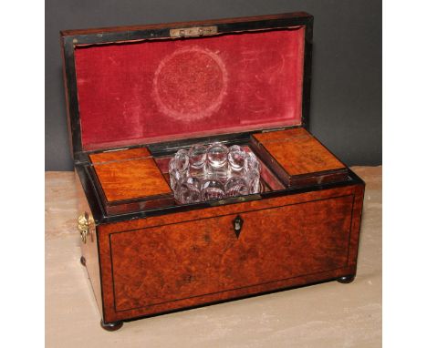 A Regency amboyna rectangular tea caddy, hinged cover enclosing a pair of canisters and a glass bowl, outlined throughout wit