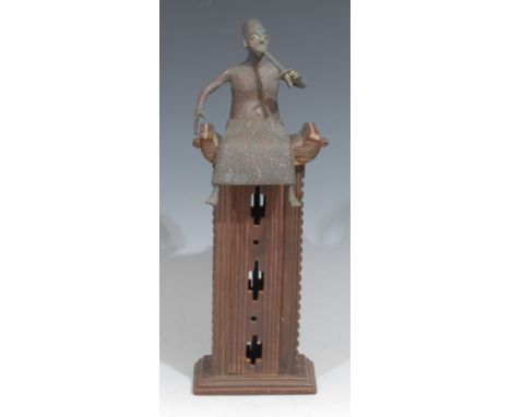 Tribal Art - an Akan/Ashanti bronze and hardwood model, of a figure smoking a pipe, seated upon an oversize tall stool, 33cm 