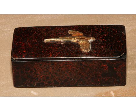 A 19th century papier mache rounded rectangular snuff box, hinged cover applied with a gilt metal pheasant, 10.5cm wide 