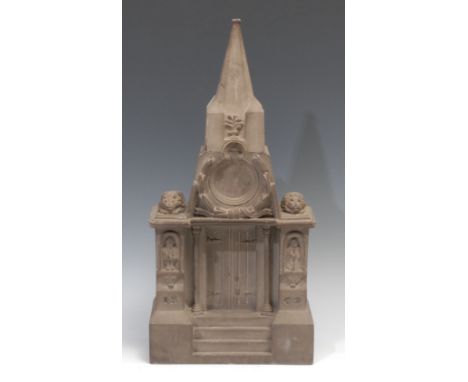 A substantial Victorian stone architectural pocket watch stand, carved as a Gothic doorway, panelled spire above provision fo