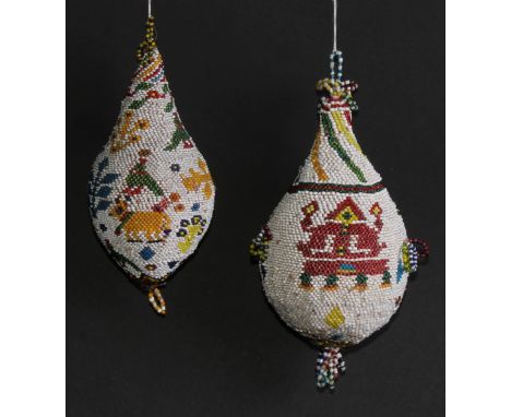 Tribal Art - an African beadwork decorated gourd, 17cm long; another, similar (2) 