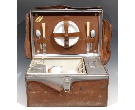 An early 20th century campaign type travelling or motoring picnic hamper, The Garrison, Reg. No. 726452, canvas outer cover 