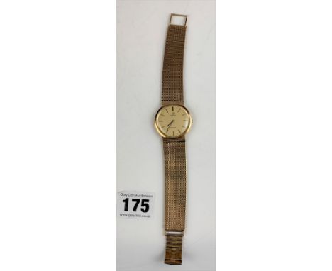 Omega De Ville Vintage Gents 9k Gold Watch and 9k Gold Strap.&nbsp; Inscribed name on the back. Running. Total weight of the 