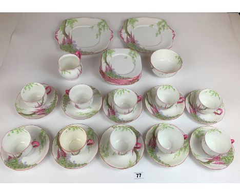 34 piece Royal Albert ‘Foxglove’ tea service to include 10 cups (2 cracked), 10 saucers (1 chipped), 10 side plates, 2 sandwi