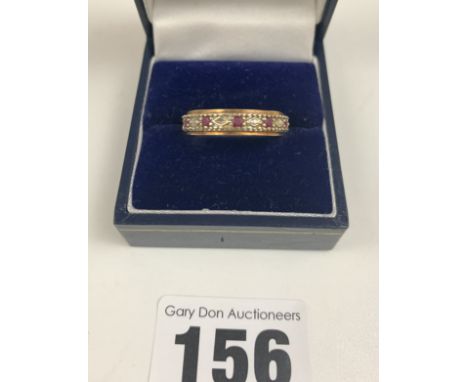 9k gold diamond &amp; red stone eternity ring, size P/Q, w: 2.6 gms