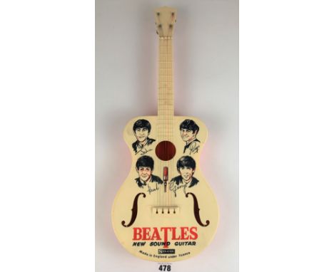 Vintage plastic Beatles guitar, 23” long