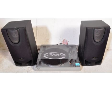A contemporary Bush Acoustics MTT2 record player having an Anti Skate dial, strobe light, EP single adaptor and more. Togethe
