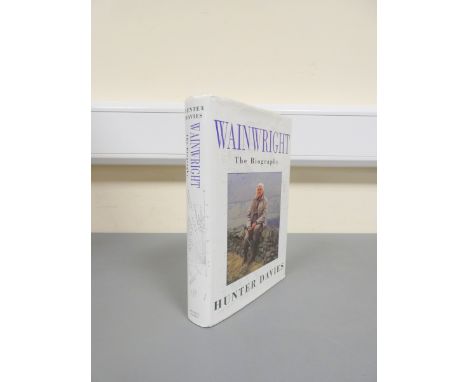 DAVIES HUNTER.&nbsp;&nbsp;Wainwright, The Biography. Illus. Orig. dark cloth in d.w. Manuscript postcard &amp; comps. slip si