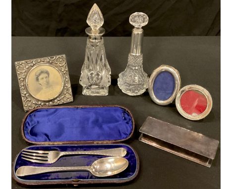 A Victorian silver christening set, London 1871, 60g, cased; An Edwardian silver photograph frame, 9cm, Birmingham 1903; a Ge