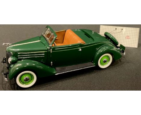 A Franklin Mint Precision Models 1:24 scale model of a 1936 Ford, boxed with inner polystyrene packaging pieces 