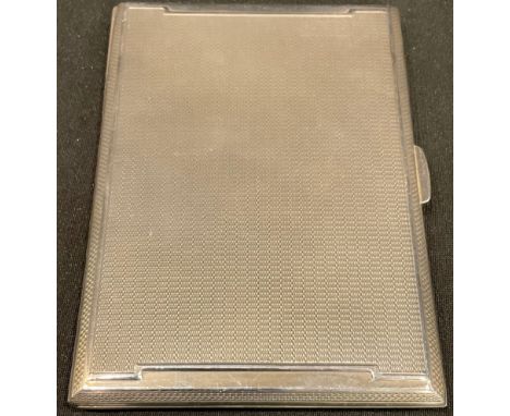 A silver cigarette case, Birmingham 1942, 208.5g gross 