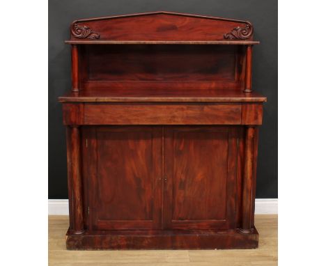 An early Victorian mahogany chiffonier, pointed-arch back with rectangular shelf, the projecting base with a long frieze draw