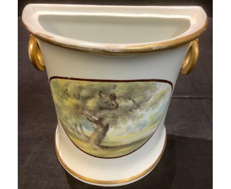 An early 19th century Davenport bough bot, oval panel painted with parklands and country house, 13cm high, c.1810 