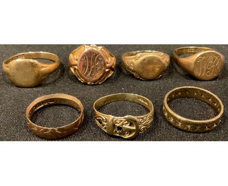 A 9ct rose gold signet ring, size O; a 9ct gold buckle ring, size S; a 9ct gold eternity ring, size Q; three other 9ct gold r