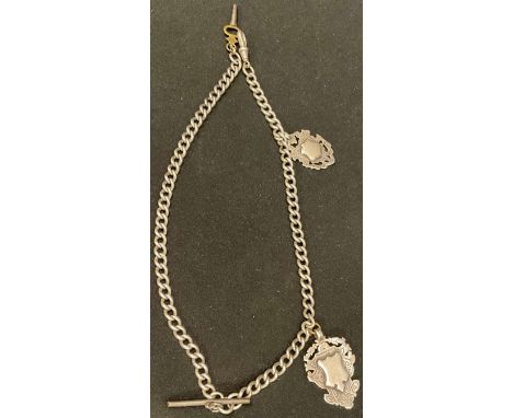 A silver curb link Albert chain with two silver fobs and pocket watch key, steel T-bar, 64g, c.1900 