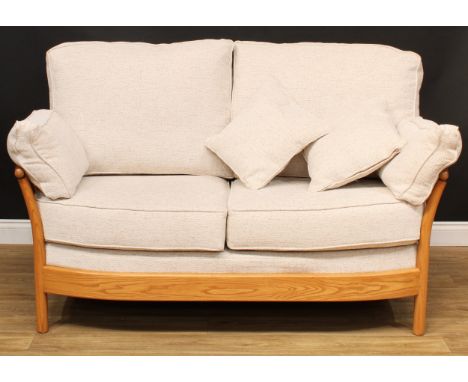 An Ercol elm Renaissance sofa, design 24112, fabric E631, 104cm high, the seat 141cm wide and 57cm deep, c.05/01/16 