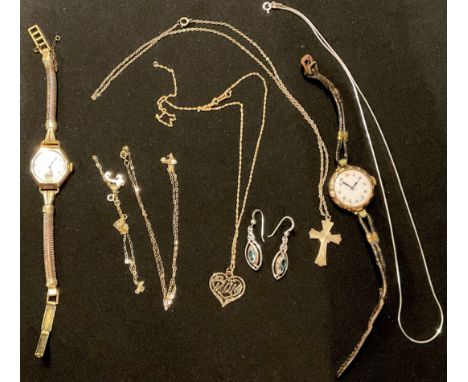 A 9ct gold pendant and chain, two 9ct gold chains, 2.2g, each boxed; a lady's gold Summit watch; a lady's gold watch; a pair 