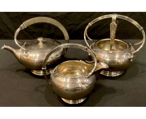 An Art Nouveau silver plated three piece tea service, by Meriden Britannia Co, Hamilton, Canada 